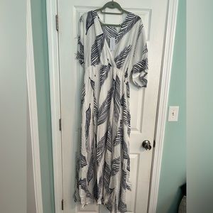 Never worn tags still on Baltic Born maxi navy and white size XL